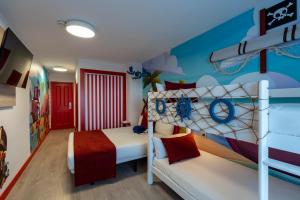 Postel nebo postele na pokoji v ubytování Hotel Magic Fantasy