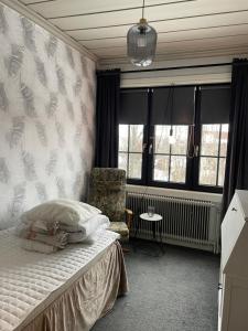 Postel nebo postele na pokoji v ubytování Villa Lyckan