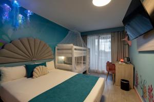Postel nebo postele na pokoji v ubytování Hotel Magic Fantasy