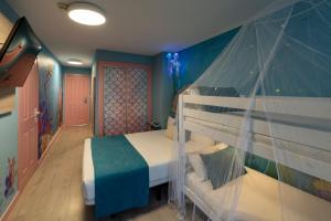 Postel nebo postele na pokoji v ubytování Hotel Magic Fantasy