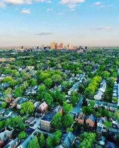 an aerial view of a city with buildings and trees at Housepitality - The Sail Away Townhouse in Columbus