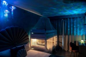 Postel nebo postele na pokoji v ubytování Hotel Magic Fantasy