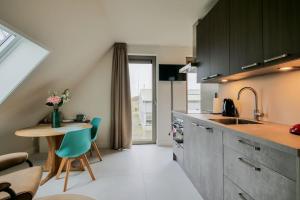 Kjøkken eller kjøkkenkrok på NEW! Het Gouden Huisje - Callantsoog