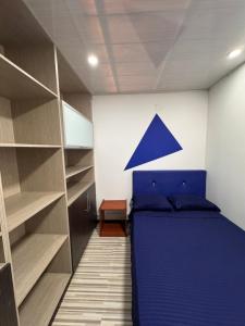 Postel nebo postele na pokoji v ubytování Hostel Bogotá Normandia Tu sitio