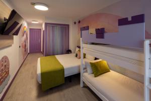 Postel nebo postele na pokoji v ubytování Hotel Magic Fantasy