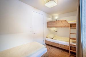 Postel nebo postele na pokoji v ubytování Stoana Apt 4-2