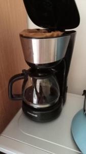 a coffee maker sitting on top of a counter at Chambre privée in Dakar