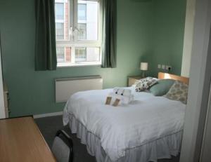 A bed or beds in a room at LSE Bankside House