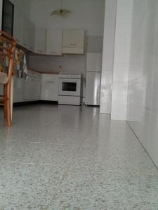 A kitchen or kitchenette at Civico 27 - In Terrazza