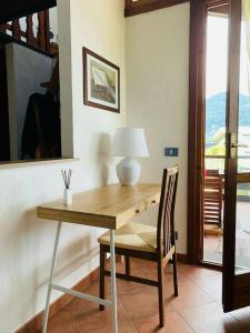 Predel za sedenje v nastanitvi Charming Apartment in Lavena Ponte Tresa - 70m² - Spacious Terrace