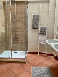 Kopalnica v nastanitvi Charming Apartment in Lavena Ponte Tresa - 70m² - Spacious Terrace