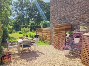 Zahrada ubytování Studio 4 pers avec balcon et jardin