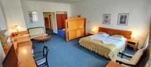 Ένα ή περισσότερα κρεβάτια σε δωμάτιο στο Hotel Magnolia