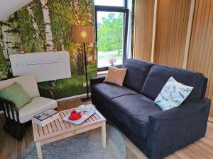 Posezení v ubytování Studio 4 pers avec balcon et jardin