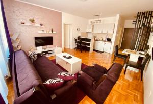 Η κουζίνα ή μικρή κουζίνα στο Apartman EMA