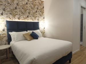 Letto o letti in una camera di Romi Suite