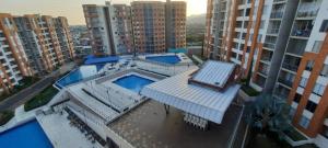 Bazén v ubytování Espectacular apartamento de 3 habitaciones con piscina y parqueadero privado Excelente Relacion Precio Calidad Puntaje nebo v jeho okolí