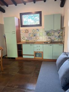 Kuchyň nebo kuchyňský kout v ubytování Agriturismo La Vergheria