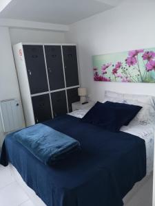 Postel nebo postele na pokoji v ubytování Hostel de las Facultades