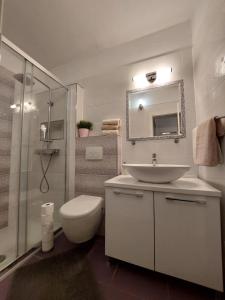 Koupelna v ubytování Apartman Nora + 5 fotografií