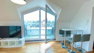 Schönes Erwachen im Frankfurter Penthouse TV 또는 엔터테인먼트 센터