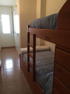 Postel nebo postele na pokoji v ubytování Spacious Apartment with Sea View Terrace in Calafell