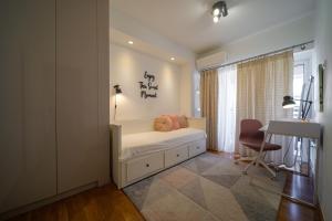 Posteľ alebo postele v izbe v ubytovaní Faliro Lux Apartment By The Sea VIPGreece