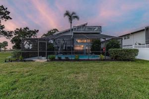 A garden outside Hernando Hideaway:Heated Pool/Decks/Dock/Balcony/Yard w/ Firepit/Kayaks