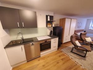 Kuchyň nebo kuchyňský kout v ubytování Ferienwohnung Blumenstiel