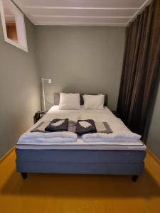 Ένα ή περισσότερα κρεβάτια σε δωμάτιο στο Charites: Terrace with Seaview - 100m to the beach