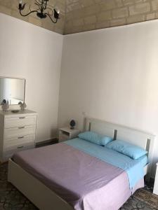 Gulta vai gultas numurā naktsmītnē Trapani Apartments