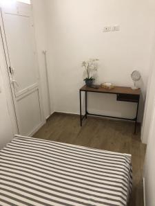 Gulta vai gultas numurā naktsmītnē Trapani Apartments