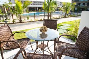 Swimmingpoolen hos eller tæt på FLAT TÉRREO - MANA BEACH EXPERIENCE - PRAIA DE MURO ALTO