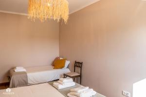 Postel nebo postele na pokoji v ubytování Palmeiras Beach House - Santa Cruz + 64 fotografií