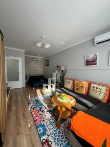 Posezení v ubytování The Master and Margarita Apartment, Майстора и Маргарита 2