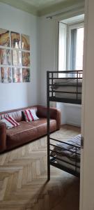 Posteľ alebo postele v izbe v ubytovaní Family Hostel Milano