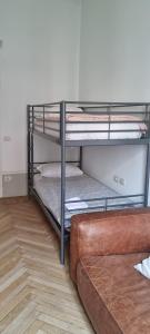 Posteľ alebo postele v izbe v ubytovaní Family Hostel Milano