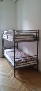 Posteľ alebo postele v izbe v ubytovaní Family Hostel Milano