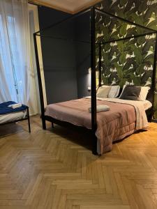 Postel nebo postele na pokoji v ubytování Family Hostel Milano