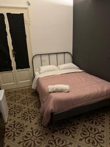 Posteľ alebo postele v izbe v ubytovaní Central Hostel Milano