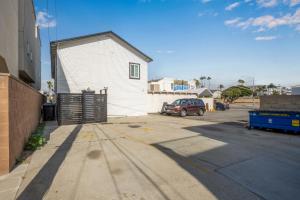 a garage with a car parked in a parking lot at 130 Anderson St B in Sunset Beach