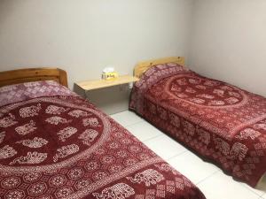 Postel nebo postele na pokoji v ubytování 藏夫私廚的家