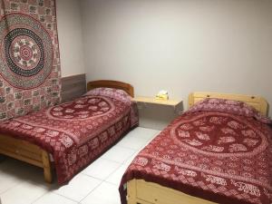 Postel nebo postele na pokoji v ubytování 藏夫私廚的家