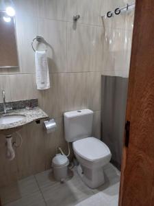 Ванная комната в Chalé Cipó Maia