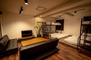 En eller flere senge i et værelse på Lifehouse IPPO - Vacation STAY 63442v