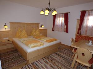 Postel nebo postele na pokoji v ubytování Ferienhaus Veider