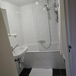 Ett badrum på Il Mulino House B