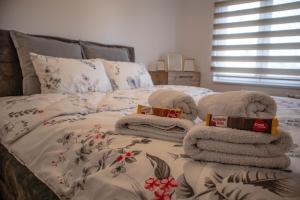 Postel nebo postele na pokoji v ubytování Lux Apartment Rose - Elite 74m2