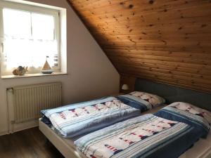 Una cama o camas en una habitación de Holiday home beacon