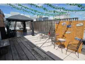Балкон или терраса в Santiago Guesthouse Hiroshima - Vacation STAY 74378v